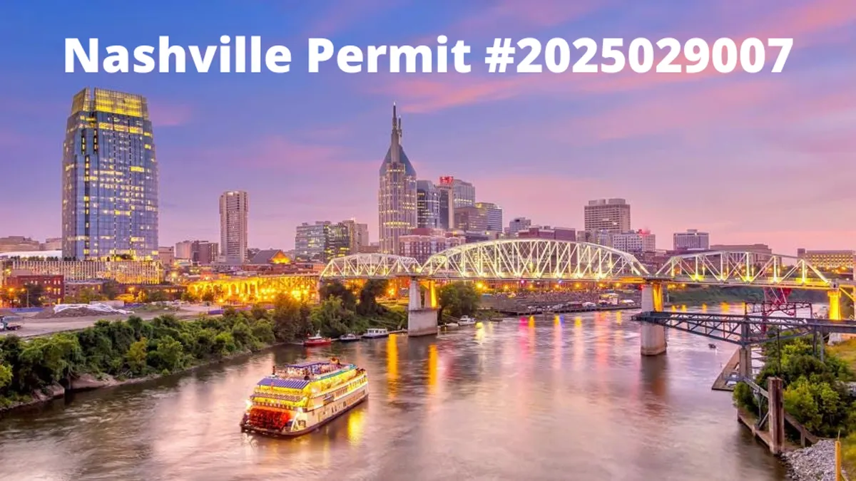 A sweeping view of the Nashville skyline, river, and vibrant city lights, capturing the energetic spirit of downtown. This view contextualizes the home’s central location and the after-business-hours opportunities available to guests.